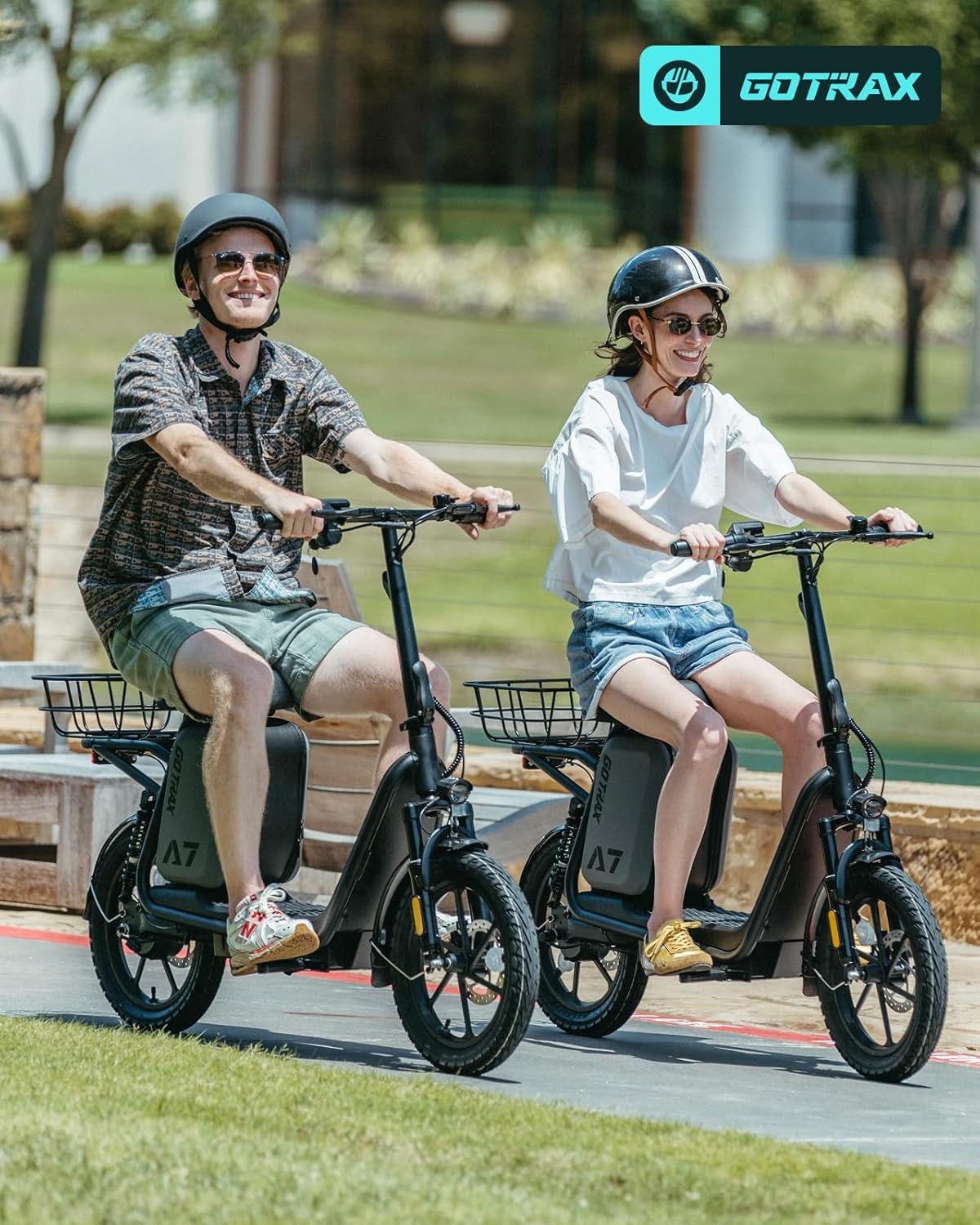 Gotrax adult electric scooter with seat, maximum range of 19-25 miles, all-terrain tires, wide pedals, padded seat, and carrycot wourant