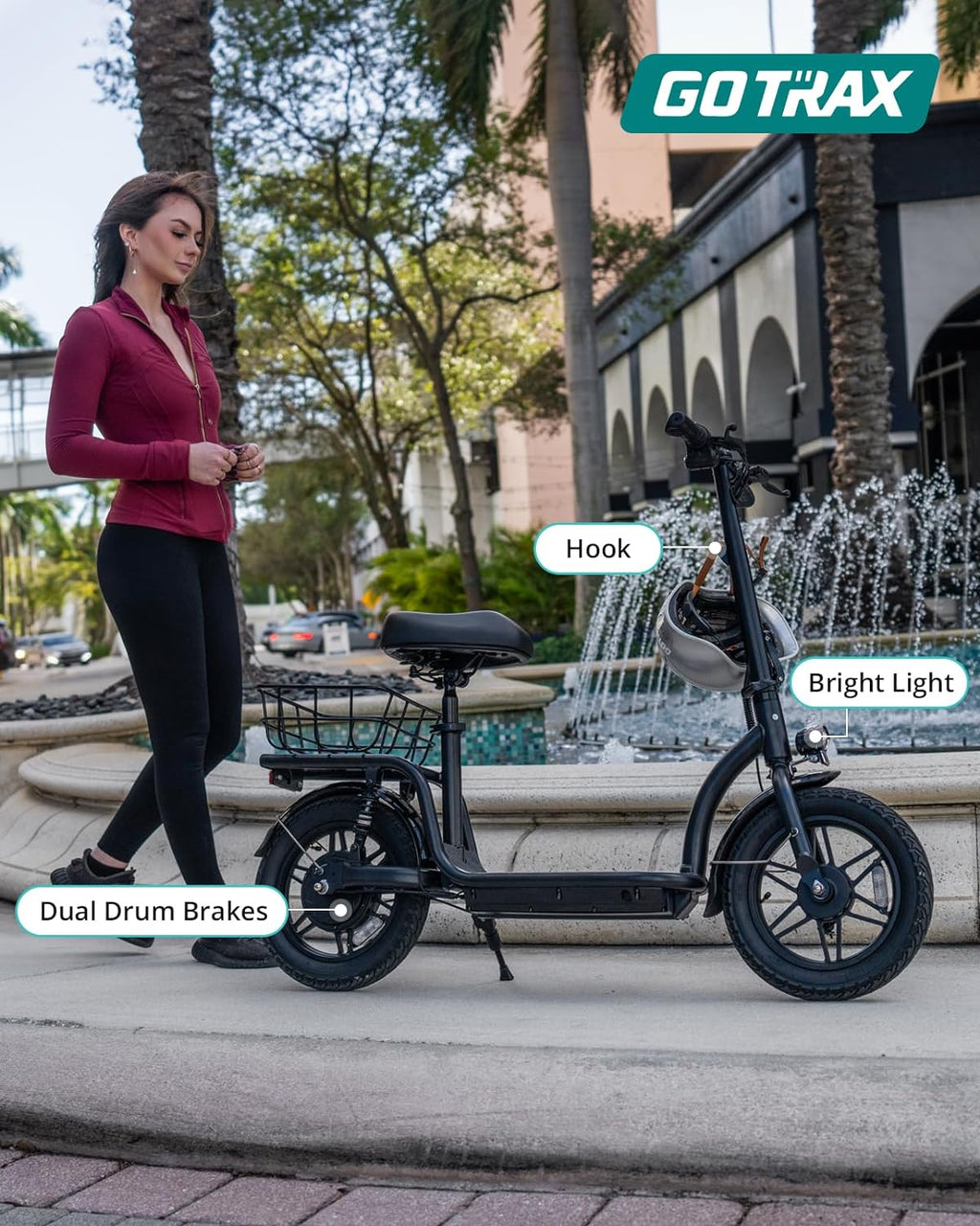 Gotrax adult electric scooter with seat maximum range of 19-25 miles all-terrain tires wide pedals wourant