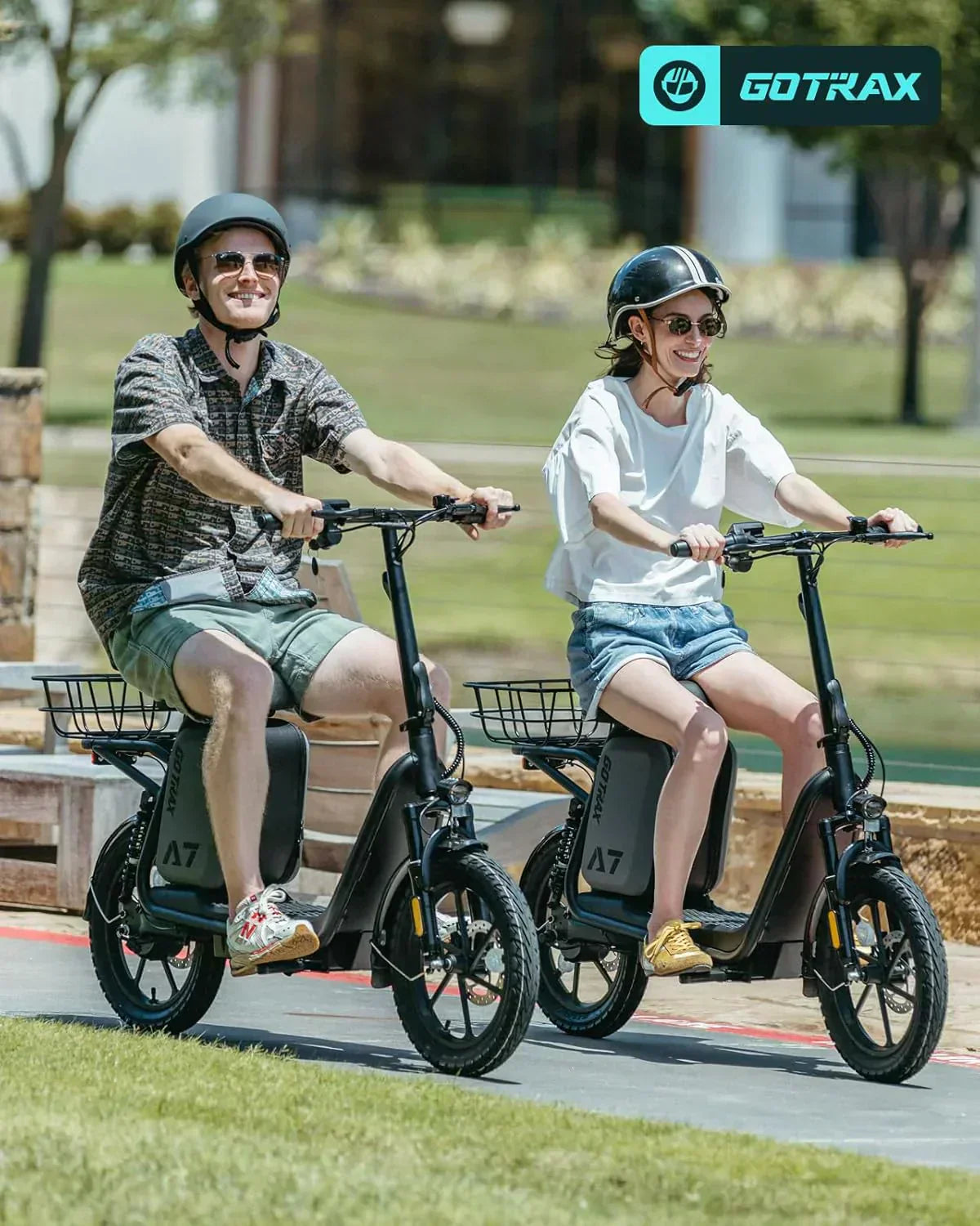 Gotrax adult electric scooter with seat maximum range of 19-25 miles all-terrain tires wide pedals wourant